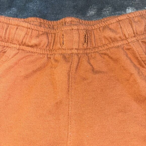 5t rust colored okie dokie cargo pants with 2 small stains on back of leg - Picture 4 of 4